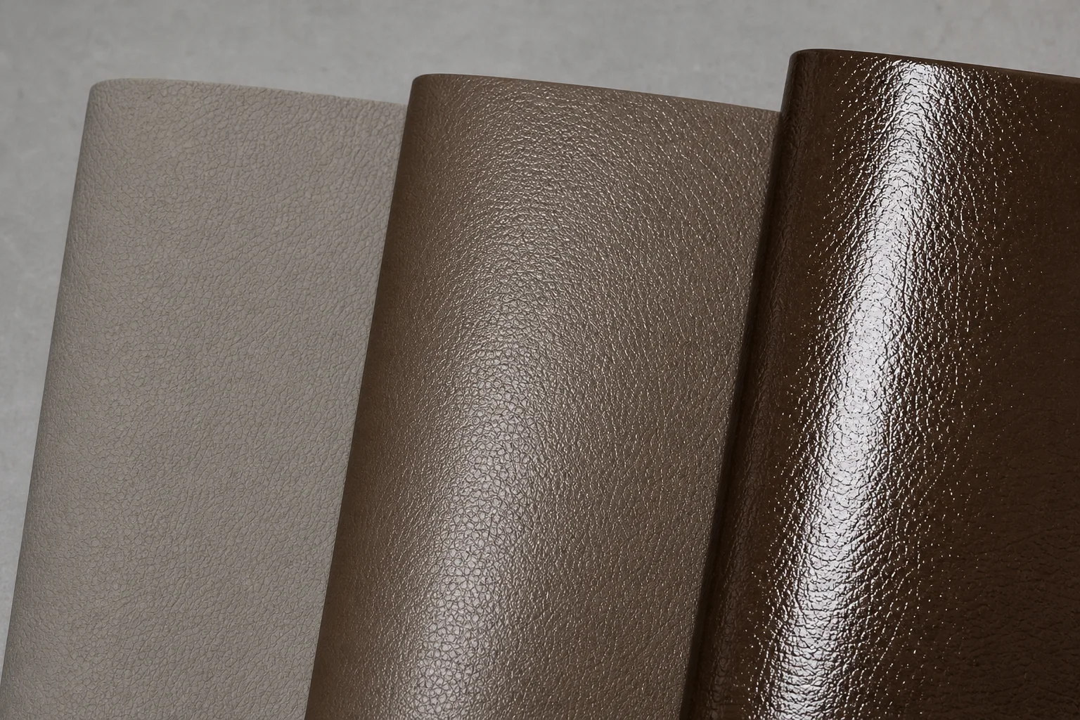 Three PU leather swatches showing matte, semi-gloss and high-gloss finishes